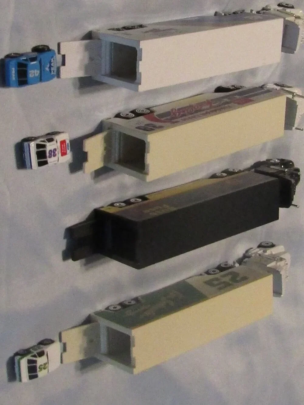 1990s RACING CHAMPIONS NASCAR TRANSPORTER TRUCKS +3cars #42 PETTY #38 #25 #15